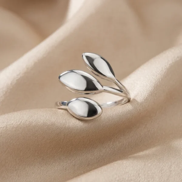 anillo triple hoja plateado