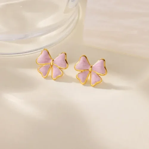 arete dorado lazo rosa