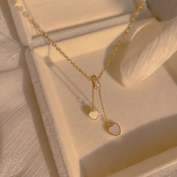 collar doble corazon dorado