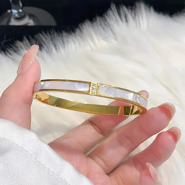 pulsera dorado concha blanca